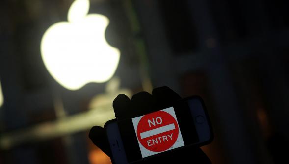 Attentat de San Bernardino , la police débloque l'iPhone d'un des tireurs sans Apple 